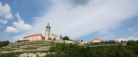 Melnik Chateau and the Church of Saint Peter and Sant Paul running over the vineyards, tourist destination in the immeditate vicinity of Pragueのeditorial素材