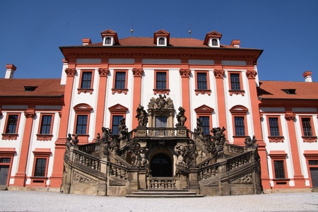 Facade of the baroque Troja Chateau with the monumental staircase decorated with statues, Pragueのeditorial素材