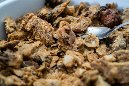 Heap of domestic salty fried pork greaves cvarci rustic deep fried crispy rind fried fatの写真素材