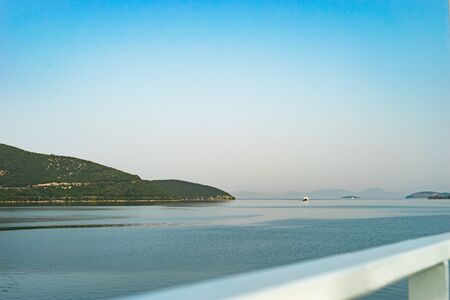 Seaside from the ferryboat on the cost in greece in a summer day travel to the corfu island