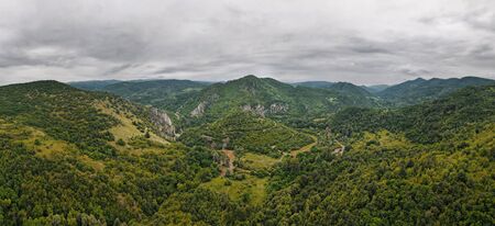 Aerial shot drone image on mountains with rocks and trees and Timok river around - Baranica near Knjazevac in eastern Serbia on Balkans - nature background no people in summer day panoramic viewの写真素材