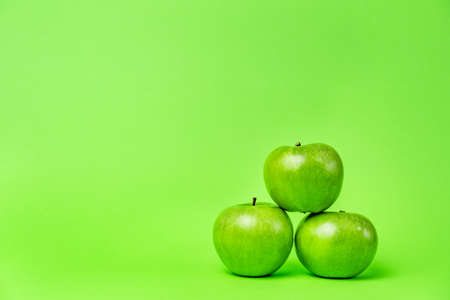 Green apples isolated on background organic healthy fruit abstract - copy spaceの写真素材