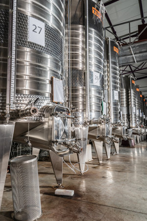 Potrkanje, Knjazevac, Serbia - 01. 19. 2021: Big metal inox tanks for wine at winery for liquid storage and fermentationのeditorial素材