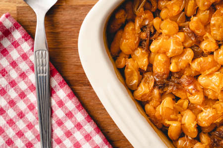 Baked beans organic homemade vegetarian and vegan dish traditional food on the table in ceramic bowl - Serbian Montenegrin bosnian macedonian croatian slovenian Bulgarian cuisine copy space top viewの写真素材