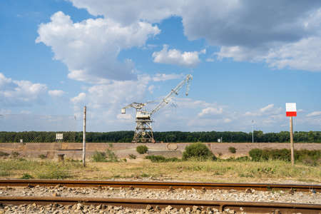 Heavy large industrial crane lifter at abounded port in sunny day in Prahovo Serbia