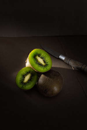 beautiful photography ripe kiwi fruits, drark backgroundの写真素材