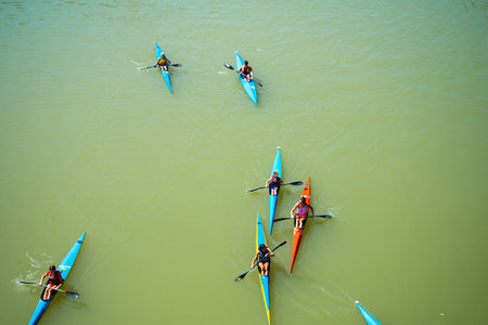 Valladolid, Spain - 07 August 2020: Peoples enjoying a ride in kayak during summer vacation,Top view...