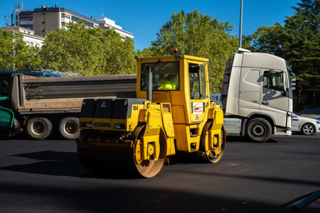 Valladolid, Spain - 02 September 2020: public workers resurfacing a road with tar, Valladolid Spainのeditorial素材