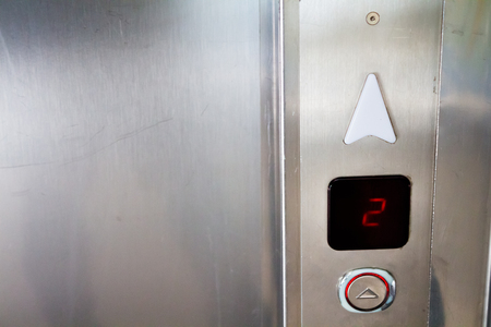 Second floor button inside an elevator illuminatedの写真素材