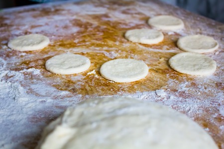 The finished dough is on the home kitchen tableの写真素材