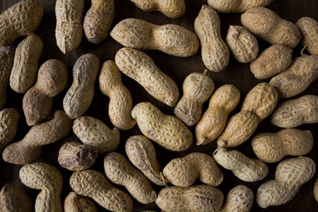 Peanuts texture. Peanuts background. Nut texture. Dry nut. Dry nut and shell. Nutrition food....
