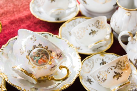 White Vintage tea set at a flea marketの写真素材