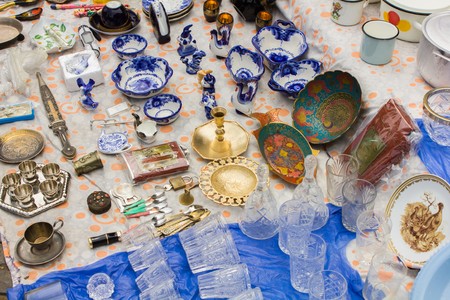 Lots of different little things lie at the flea marketの写真素材