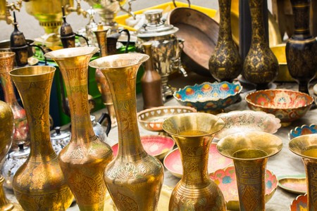 Many interesting original vintage cookware at a flea marketの写真素材