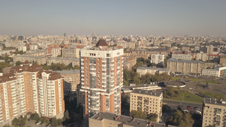 Panoramic view residential buildings in city. City infrastructure modern town. Architecture and moving car on road aerial view. High rise residential apartment in city. Modern residential area in cityの写真素材