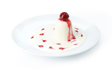 Restaurant food - panna cotta dessert isolated at the white backgroundの写真素材