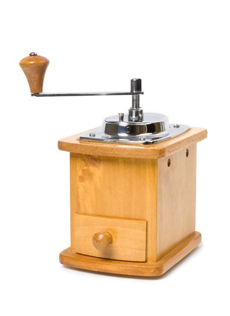 Hand coffee-grinder isolated at the white backgroundの写真素材