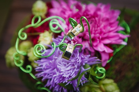 Composition of flowers in heart shape as wedding decor elementの写真素材