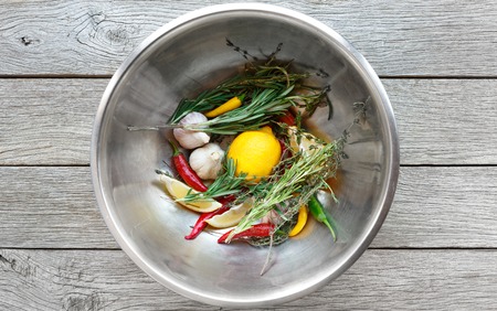 Cooking background, herbs and seasoning bowlの写真素材