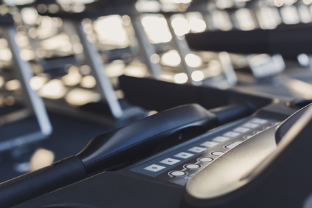 Modern gym interior equipment, treadmill control panel for cardio training