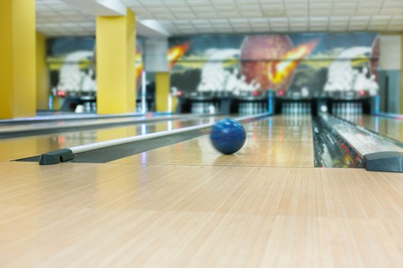 Bowling accessories background. Interior of bowling alley, lane with ballの写真素材
