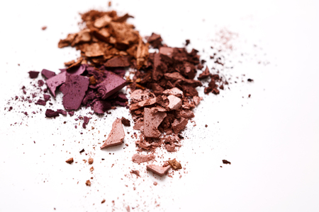 Makeup cosmetics. Eyeshadow crushed palette, colorful eye shadow powder on white backgroundの写真素材