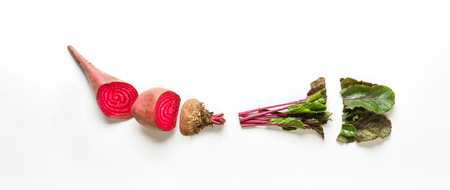 Healthy organic food. Raw cut beetroot, cooking ingredient on white isolated studio background, top view, flat lay, objectの写真素材