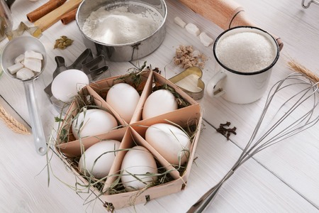 Baking background. Cooking ingredients for dough and pastry making on white rustic wood. Culinary classes conceptの写真素材
