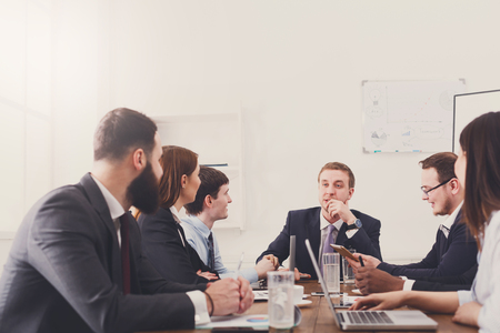 Business people meeting, young team. Office strategy planning, communication with partnersの写真素材