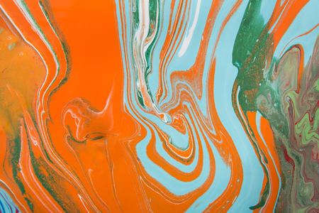 Liquid marbling paint background. Fluid painting abstract texture. Colorful mix of acrylic vibrant colors.の写真素材