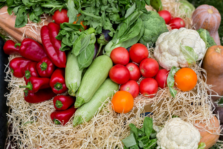 Organic farmers food market place. Fresh products -  vegetables on sale at the local market, close-up, top viewの写真素材