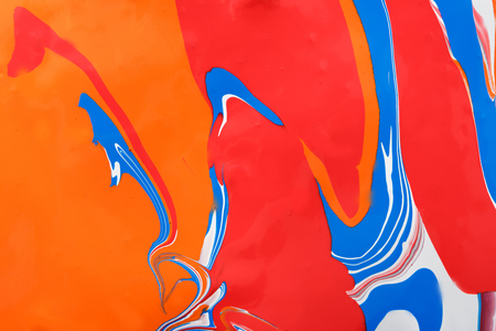 Liquid marbling paint background. Fluid painting abstract texture. Colorful mix of acrylic vibrant colors.の写真素材