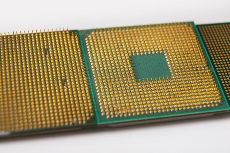 Computer processor chip close-up. New CPU, technology repair shop, device upgrade, electronic development conceptの写真素材