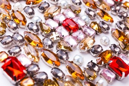 Colorful gemstones, jewelry background. Assortment of bright mounted stonesの写真素材