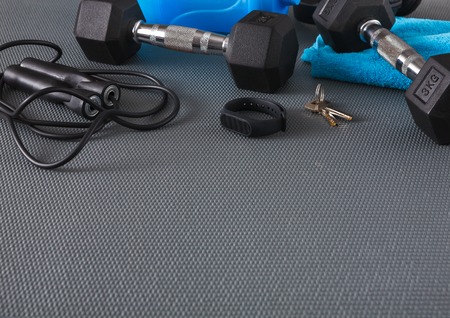 Fitness background, blue sport equipment for training, copy space. Weightloss, healthy lifestyle conceptの写真素材