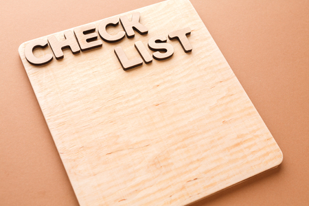 Check list words with wooden board, copy space. Time management, business optimization conceptの写真素材