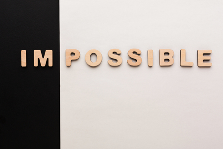 No impossible, only possible concept. Meaning change on black and white background, challenge, motivation conceptの写真素材