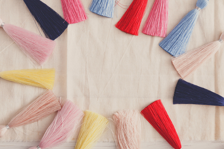 Colorful tassel earrings assortment. Beautiful handmade jewelry for women. Beauty, fashion, style conceptの写真素材