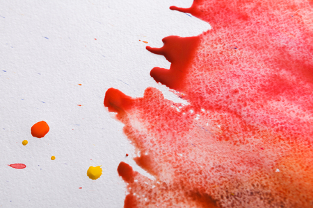 Abstract watercolor background. Hand painted brush strokes on white paper. Top view, copy spaceの写真素材