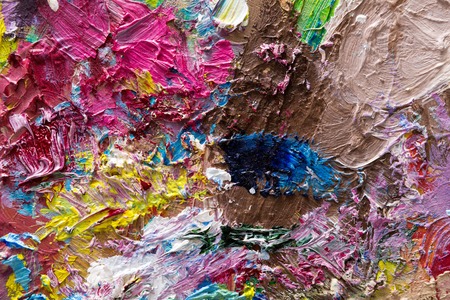 Palette with colorful mixed oil-paints texture on canvas, close-up, modern art, objectの写真素材