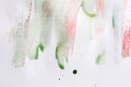 Minimalistic abstract watercolor textured background. Hand painted brush strokes on white paper, top view, copy spaceの写真素材
