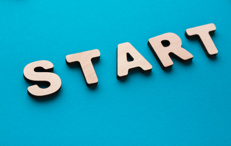 Word Start on blue background. New beginning, startup, challenge conceptの写真素材
