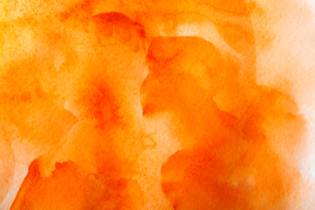 Abstract watercolor yellow and orange spot painted texture background.の写真素材