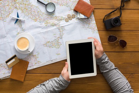 Travel planning and technologies concept. Searching or booking tickets online, preparation for...