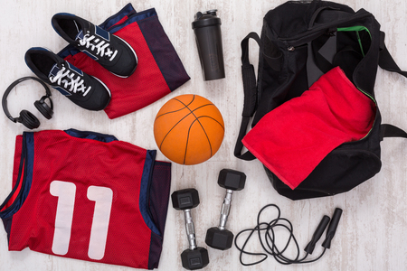 Basketball player outfit background top view. Set of fitness male outfit. Active lifestyle, body care conceptの写真素材