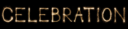 Celebration text made from burning sparkles on black background. Shiny festive party firework font.の写真素材