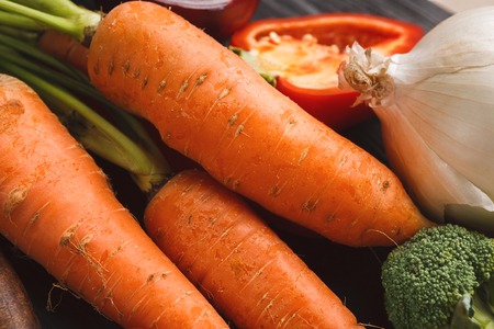 Carrots closeup texture and background. Natural pattern. Healthy organic food conceptの写真素材