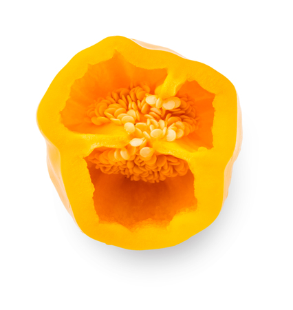 Half of ripe yellow sweet pepper isolated on white background. Closeup of ideal vegetable, healthy natural organic food, harvest conceptの写真素材