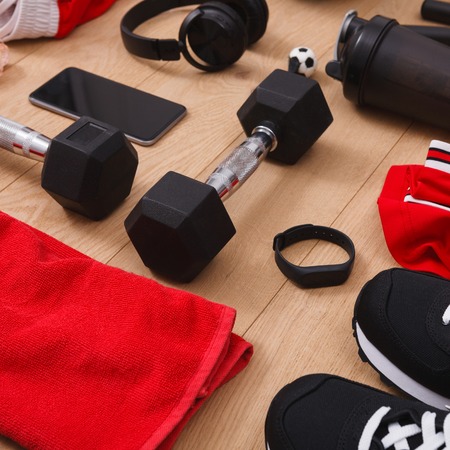 Workout, soccer and sport equipment background. Set of fitness male outfit. Active lifestyle, body care conceptの写真素材