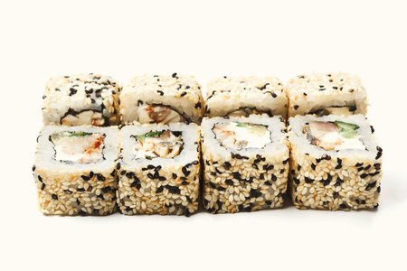 Sushi japanese restaurant delivery. Set of california rolls isolated on white background closeup, copy space. Healthy seafood, cutout for menuの写真素材